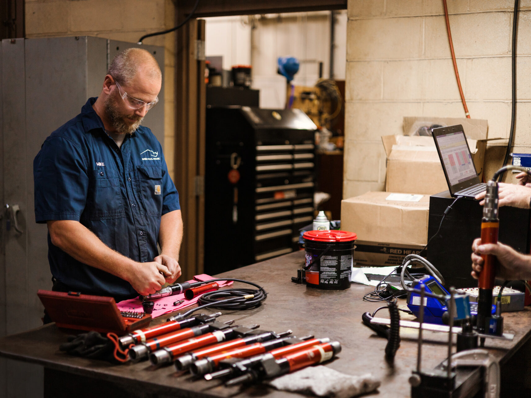 man organizing tools | Rhino Innovation